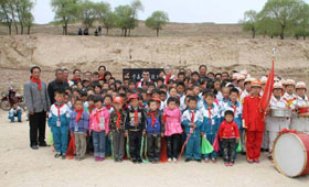 A group photo with the students & the teachers