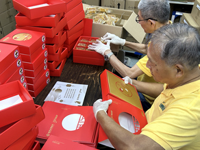 The senior staff of Gingko House came together to wrap the CMB Wing Lung Bank Mooncakes with love and care